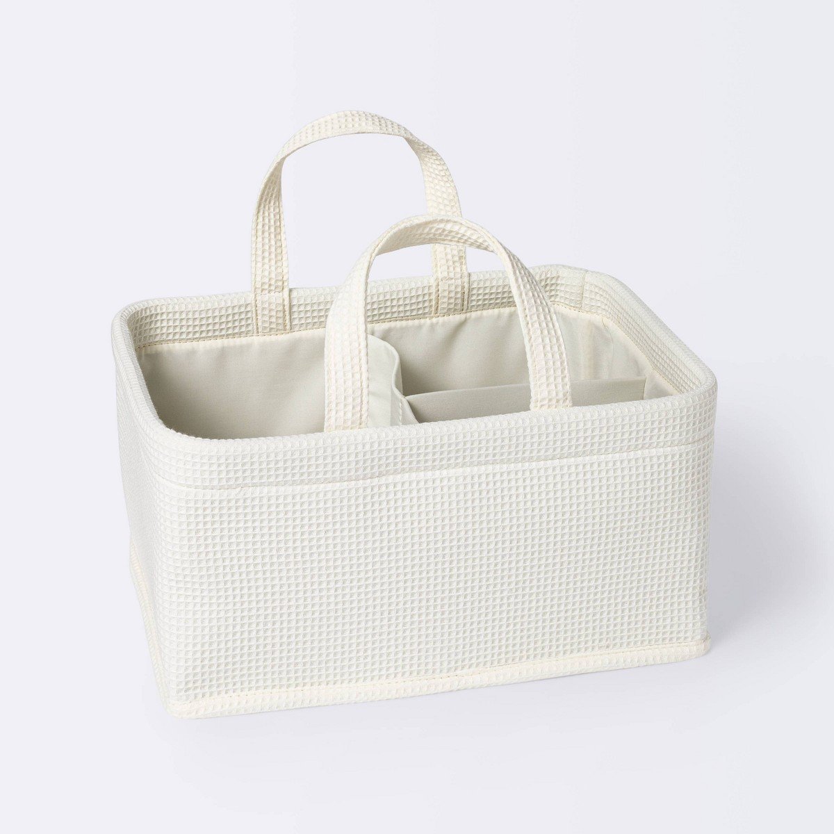 GUEST_6f8c7b6a-c42b-4b59-9fe7-ca31b08d42d8.jpg Waffle Weave Rectangular Diaper Caddy with Handles - Cloud Island™ Cream: Fabric, 13.5" Depth, 897.75 Volume - Image 1