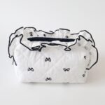 Alilang Womens Quilted Bow Print Cosmetic Bag with Ruffle Trim - Black