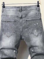 Men's jeans with splatter graffiti, ripped patches, distressed wash, slim fit, slimming, versatile casual long pants - Image 3