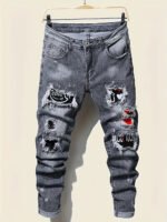Men's jeans with splatter graffiti, ripped patches, distressed wash, slim fit, slimming, versatile casual long pants