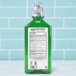 ACT Restoring Zero Alcohol Fluoride Mouthwash 33.8 fl. oz. Strengthens Tooth Enamel, Mint Burst - Image 2